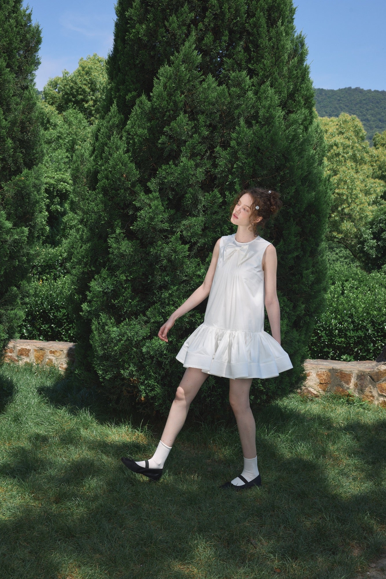 ‘Arista’ White Bow-tie Vest Dress