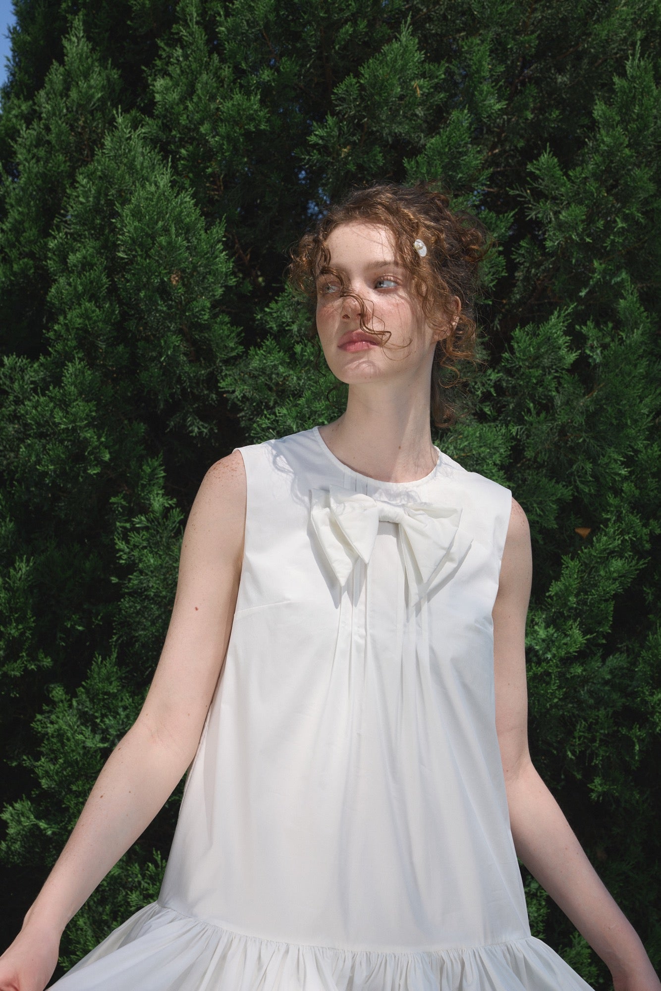 ‘Arista’ White Bow-tie Vest Dress
