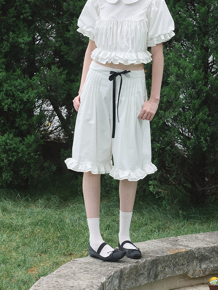 ‘Eric’ White Bow Mid-length Shorts